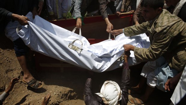 Shiite rebels bury the body of a fellow Houthi killed in fighting against Saudi-backed Yemeni forces in Marib province earlier this month.