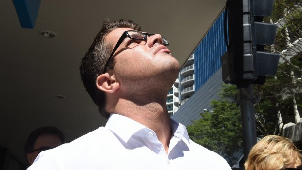Gable Tostee looks to the sky during his trial for murder at the Brisbane Supreme Court.