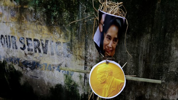 An effigy of Myanmar's State Counsellor Aung San Suu Kyi is placed against a wall before it was burnt by activists of an ultra-leftist organisation in Kolkata, India.