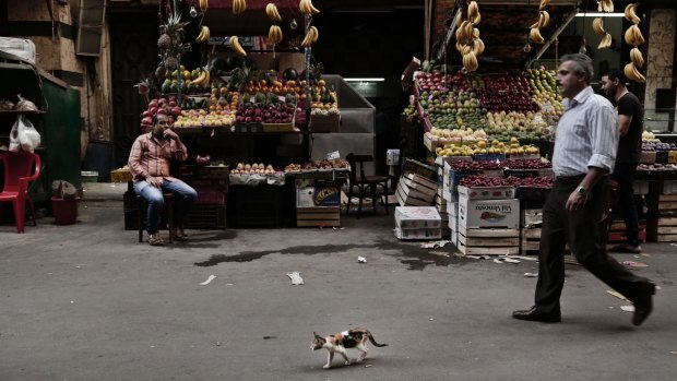 Tawfiqiya fruit and vegetable market in downtown Cairo. Egypt's economy has been battered by unrest since the 2011 uprising that toppled dictator Hosni Mubarak.