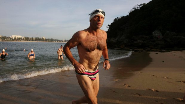 Mr Abbott competing in a charity swim in 2010, after which his budgie smugglers were auctioned on eBay.