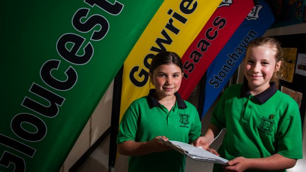 Turner School sisters Ellie Archer nine, and Ruby Archer, 11, are campaigning to have one of their school's sporting houses named after a female and have started a petition to gain support.