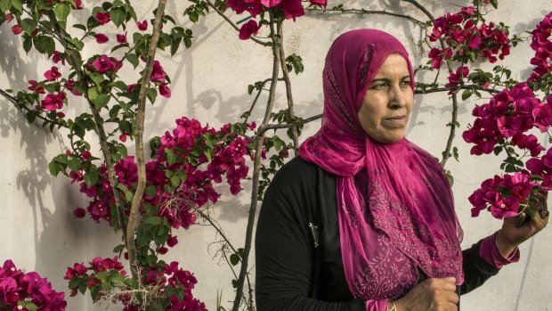 Hamida Ajengui, at home in Tunis, was 21 when she was arrested and beaten by Tunisia's state police.
