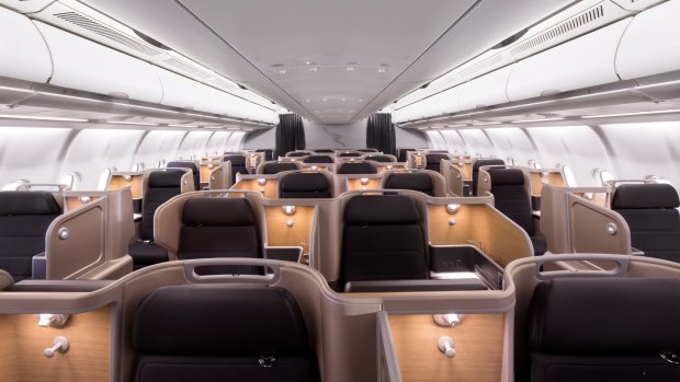 Business class has 28 suites in a 1-2-1 layout, giving each passenger direct aisle access.