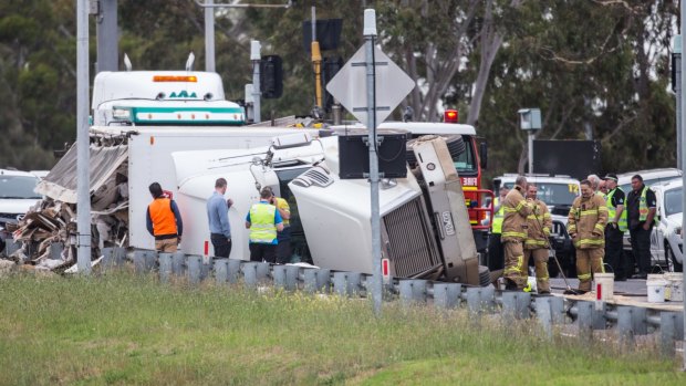 The truck rolled over at Blackburn Road on-ramp causing traffic chaos on the Monash Freeway.