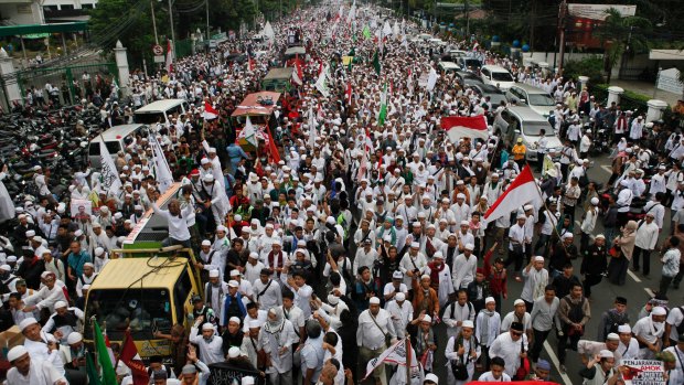 Thousands protest against Jakarta Governor Basuki Tjahaja Purnama on Friday.  