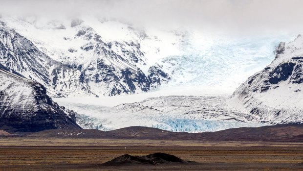 Solheimajokull Glacier – a tongue of the even more immense Myrdalsjokull Icecap – squats atop the country's most powerful volcano, hidden beneath 800 metres of ice.