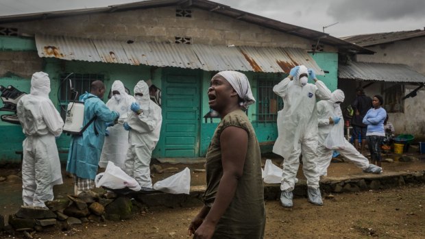 New York Times photographer Daniel Berehulak won the award for feature photography for a series of poignant portraits, shot across months, documenting Ebola's deadly spread in West Africa.