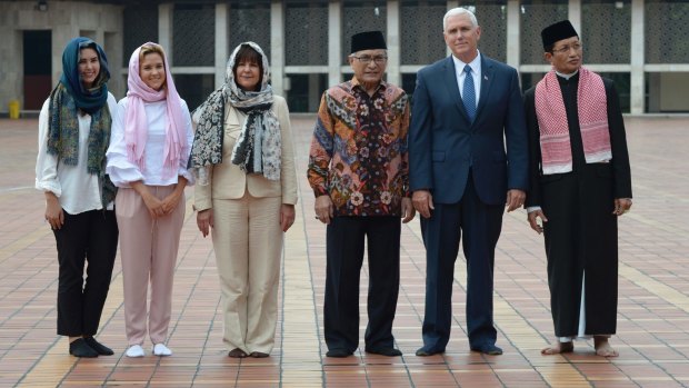 US Vice-President Mike Pence with (from left) his daughters Audrey and Charlotte, his wife Karen, the chairman of Istiqlal Mosque Muhammad Muzammil Basyuni and the Grand Imam of the mosque, Nasaruddin Umar.