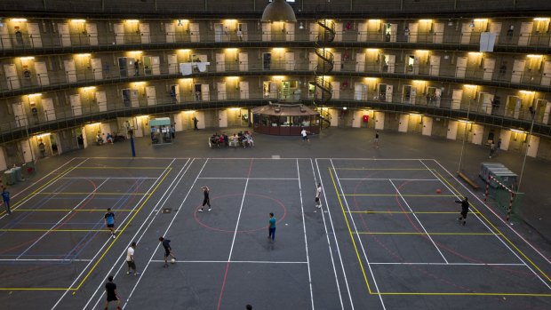 Migrants play football at the former prison of De Koepel in Haarlem, Netherlands. 