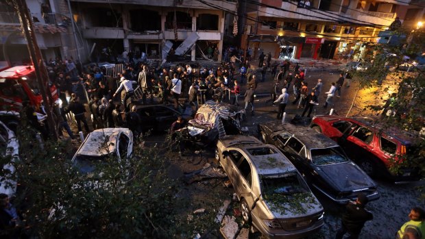 Lebanese gather at the site of an explosion during rush hour in southern Beirut, the stronghold of Hezbollah, in January 2014. 