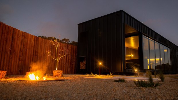 Designed by Adelaide-based architecture, interior design and landscape practice DAS Studio, the customised black suites are made off site and positioned by crane to minimise impact on the environment.