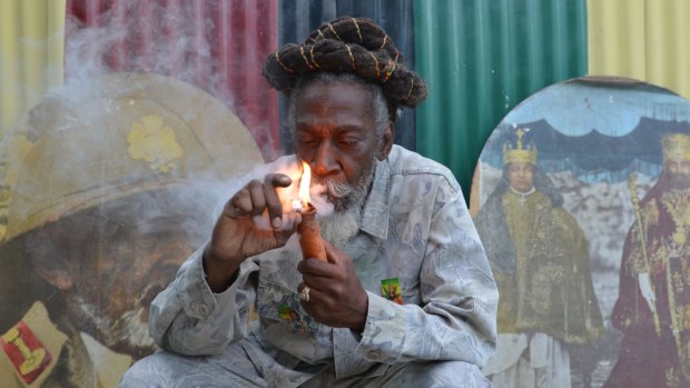 Legalisation advocate and reggae legend Bunny Wailer burns one down.