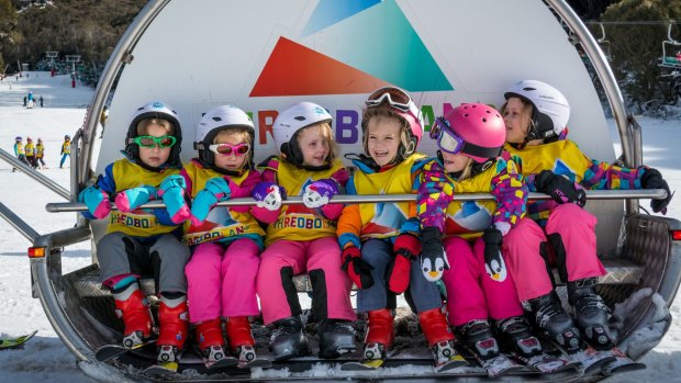 Young skiers enjoy the opening of the ski season.