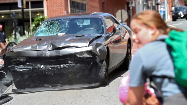The car reversing after driving into a group of protesters demonstrating against a white nationalist rally in Charlottesville on Saturday.