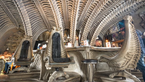 Interior of HR Giger cafe in Gruyeres, themed along the lines of his biomechanical style as shown in the Alien films.