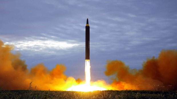 A photo released by North Korean media in August 2017 of the test launch of a Hwasong-12 intermediate range missile.