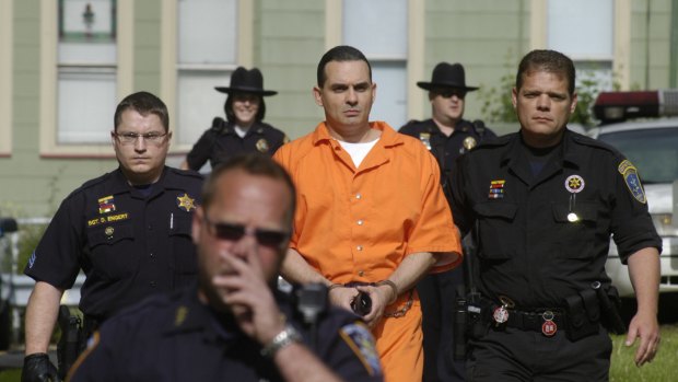 This 2008 photo shows convicted killer Richard Matt,being led by officers into Niagara County Court for sentencing.