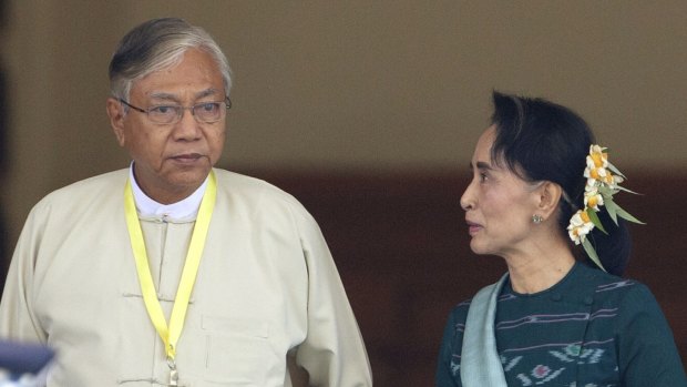 Htin Kyaw, newly elected President of Myanmar, walks with National League for Democracy leader Aung San Suu Kyi, in Naypyitaw earlier this month. 