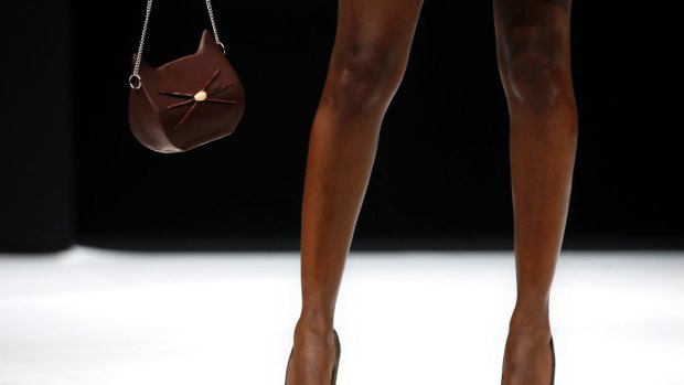 A model presents a handbag in chocolate during a show as part of the chocolate fair in Paris, on October 27.