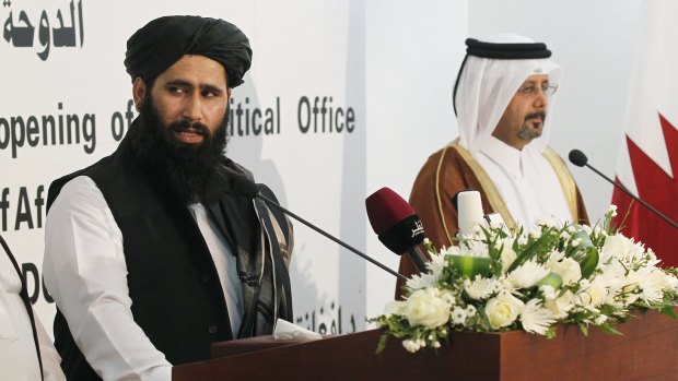 Muhammad Naeem, left, a spokesman for the Taliban, at the opening of the Taliban  political office in the Qatari capital Doha in June 2013, part of the fitful process of "talks about talks".