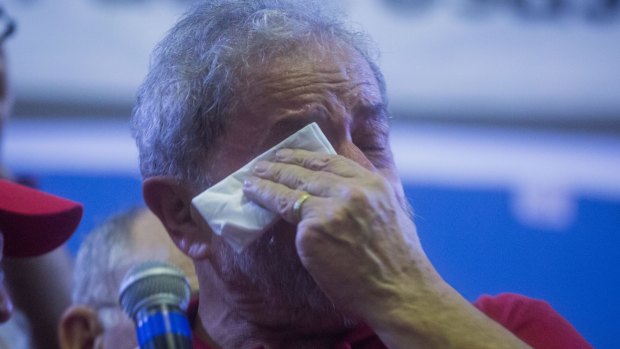 Former Brazilian president Lula cries at a rally at his Partido dos Trabalhadores (Workers' Party) headquarters on March 4. Mr Lula is under separate investigations by state and federal authorities in Brazil.