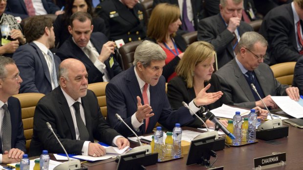 US Secretary of State John Kerry speaks during a meeting of the global coalition to counter the Islamic State militant group.