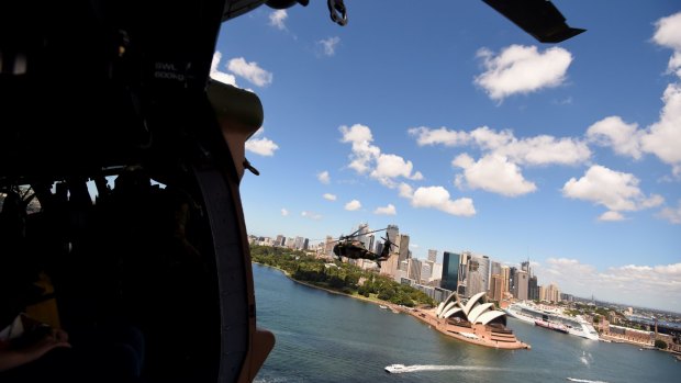 Fast and durable: An aircraft manned by special forces officers flies over Sydney. 
