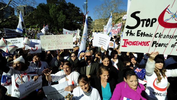 Protesting the purging of Christians in Mosul: Demonstrators gather in the streets of Sydney.