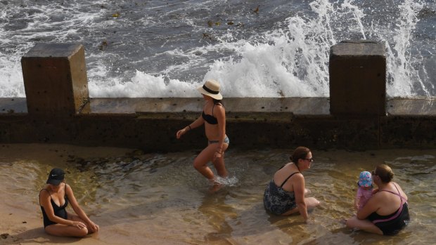 Cool relief: Sydney's temperatures passed 30 degrees by 9:30am.