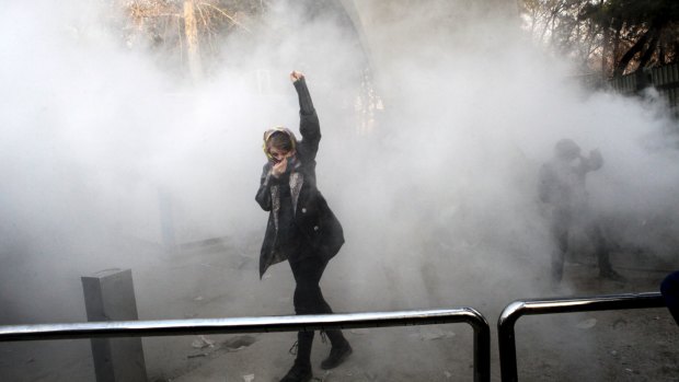 A university student at a protest inside Tehran University.