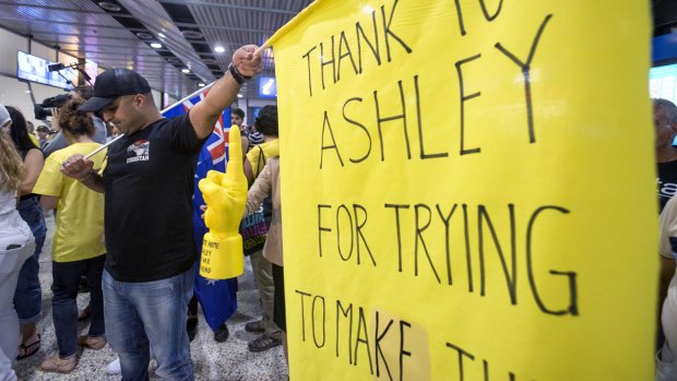 Supporters of anti-Islamic State fighter Ashley Dyball await his return at Melbourne Airport.