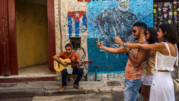 Travellers love to celebrate Cuba's decay, to treat its shabby buildings and its old cars as a thing to promote and to cherish.