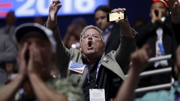 People react to Senator Ted Cruz as he addresses the delegates during the third day session of the Republican National Convention in Cleveland on Wednesday.