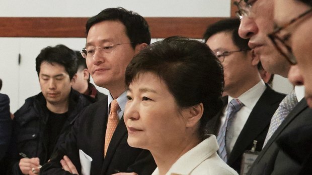 Impeached South Korean President Park Geun-hye, centre, with a selected group of reporters at the presidential house in Seoul on New Year's Day.