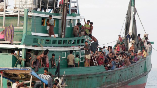 Rohingya and Bangladeshi refugees await rescue by  Acehnese fishermen off East Aceh, Indonesia, in May.