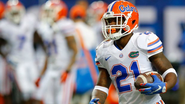 Niners draftee: Running back Kelvin Taylor takes the ball up for the Florida Gators last season.