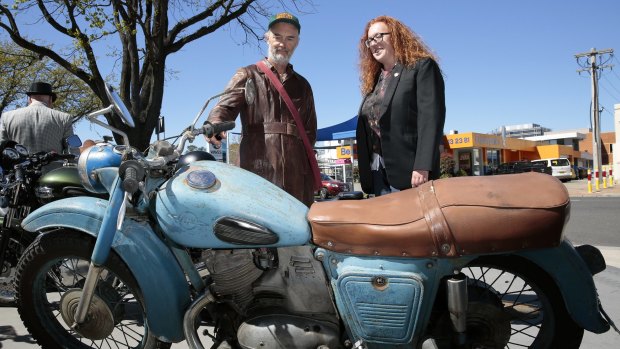Don Thomas, of Gunning, checks out a 1959 Russian Izh motorcycle belonging to Heidi Pritchard, of Fraser.
