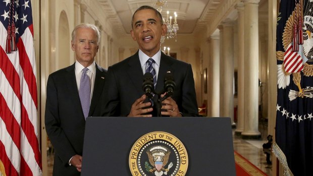 US President Barack Obama delivers a statement about the nuclear deal with Vice President Joe Biden at his side during an early-morning address to the nation from the White House in Washington.