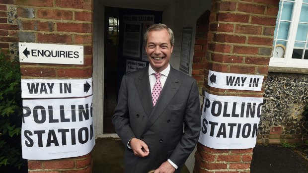 Nigel Farage prepares to vote in the referendum. 