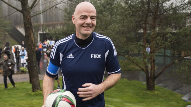 Match ready: New FIFA president Gianni Infantino arrives with a ball for a friendly in Zurich.