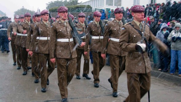 British soldiers parade in Port Stanley, Falkland Islands, as Falkland Islanders commemorate Liberation Day paying homage to British soldiers who died in the 1982 war against Argentina. 