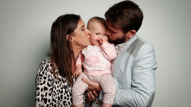 Bethan McElwee and Jonathan McElwee with their one-year-old daughter Aviana in Canberra last month.