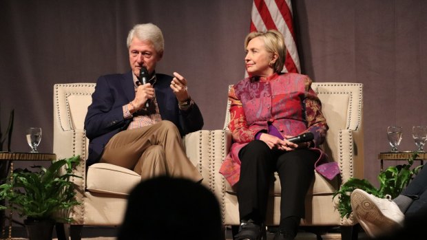 Accompanied by his wife, Hillary Clinton, former President Bill Clinton marks 25 years since his election, last month.
