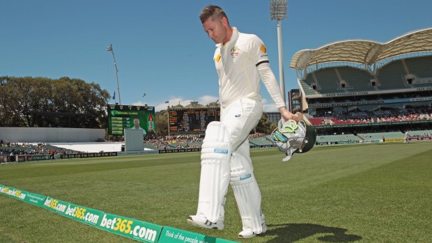 Sad walk off: Michael Clarke leaves the Adelaide Oval after injuring his back.