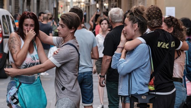 Pedestrians in shock moments after the van drove through crowds on Las Ramblas in Barcelona.