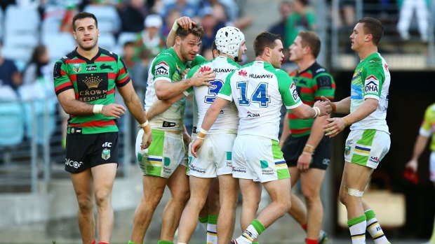 One-way traffic: Elliot Whitehead celebrates one of Canberra's 10 tries against Souths.