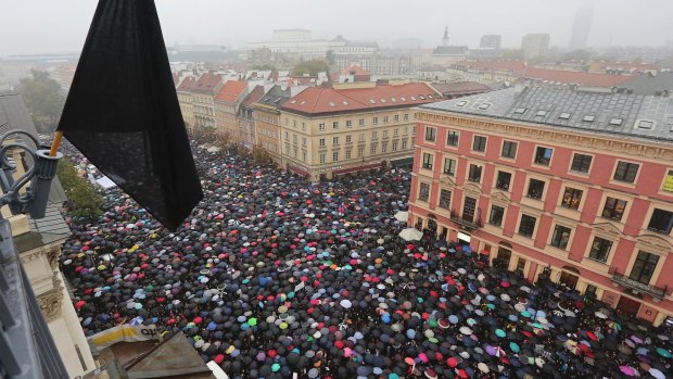 A sea of thousands of umbrellas of people participating in the nationwide Black Monday strike to protest a legislative proposal for a total ban on abortion in Warsaw, Poland, 