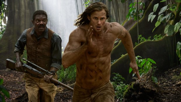 Alexander Skarsgard  and Samuel L. Jackson dash through the jungle.