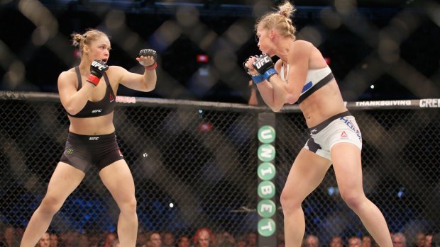 Holly Holm and Ronda Rousey fight during UFC 193 at Etihad Stadium.